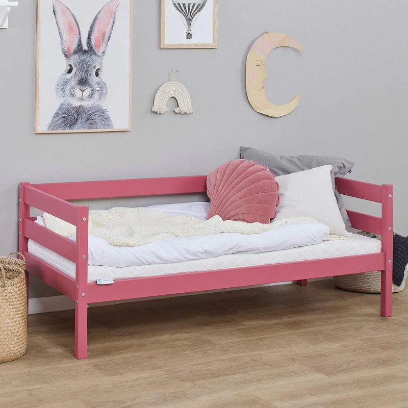 Baroque Rose wooden frame junior bed in decorated room, angled view